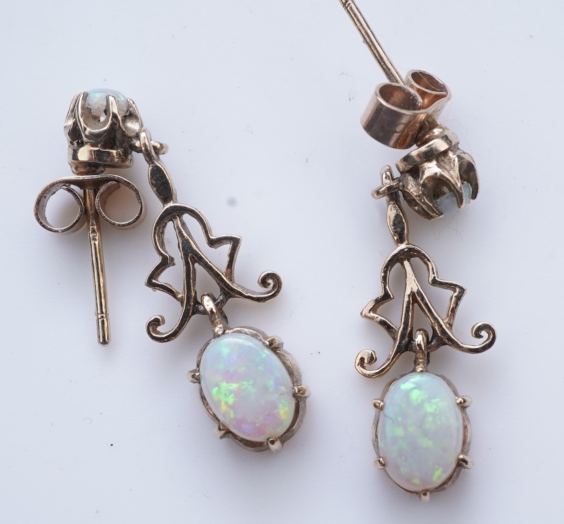 Eight pairs of earrings and pendant, comprising: a pair of onyx studs; a pair of emerald studs; a pair of sapphire and diamond drop earrings; a pair of opal drop earrings; a pair of garnet drop earrings; and a shell pend